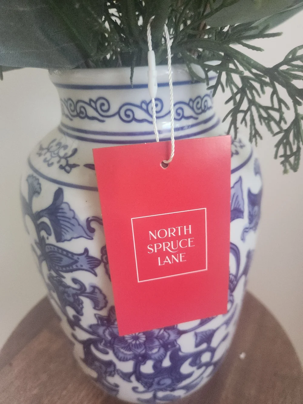 Blue and White Chinoiseire Ceramic Ginger Jar Vase with Holiday Pine Arrangement